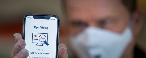 FILE PHOTO: The National Institute of Public Health's new app Smittestopp (Infection Stop) for infection tracking is pictured, in Oslo, Norway April 16, 2020. Picture taken April 16, 2020 - Sputnik International