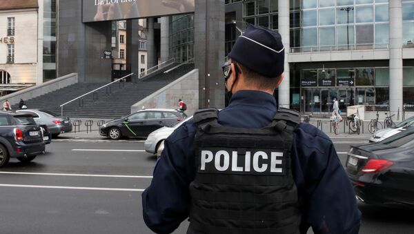 A French police stands near the Opera Bastille where a suspect in a stabbing attack near the former offices of the magazine Charlie Hebdo has been arrested in Paris, France September 25, 2020 - Sputnik International