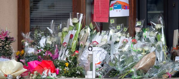 Flowers at the Bois d'Aulne college are seen after the attack in the Paris suburb of Conflans St Honorine, France, October 17, 2020. Flowers at the Bois d'Aulne college are seen after the attack in the Paris suburb of Conflans St Honorine, France, October 17, 2020. - Sputnik International