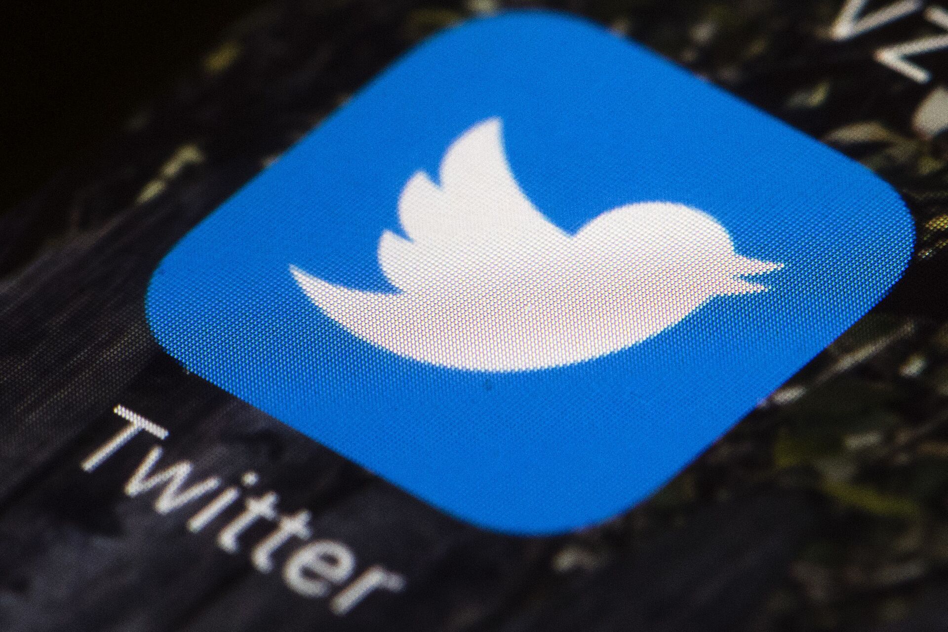 This April 26, 2017, file photo shows the Twitter app icon on a mobile phone in Philadelphia. A tech-focused civil liberties group on Tuesday, June 2, 2020, sued to block President Donald Trump's executive order that seeks to regulate social media, saying it violates the First Amendment and chills speech - Sputnik International, 1920, 06.01.2022