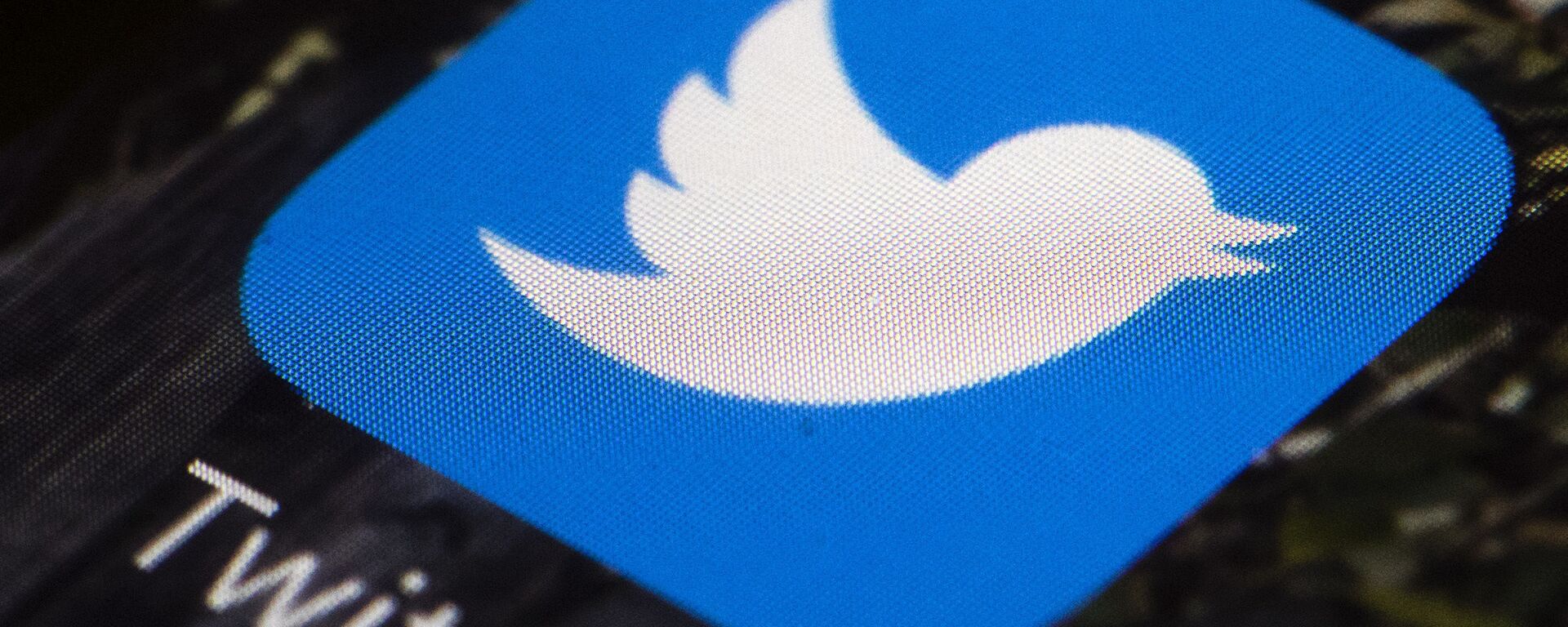 This 26 April 2017 file photo shows the Twitter app icon on a mobile phone in Philadelphia. A tech-focused civil liberties group on Tuesday, 2 June 2020, sued to block President Donald Trump's executive order that seeks to regulate social media, saying it violates the First Amendment and prevents free speech. - Sputnik International, 1920, 10.03.2021