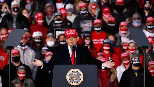 U.S. President Donald Trump speaks during a campaign rally at Southern Wisconsin Regional Airport in Janesville, Wisconsin U.S., October 17, 2020. - Sputnik International