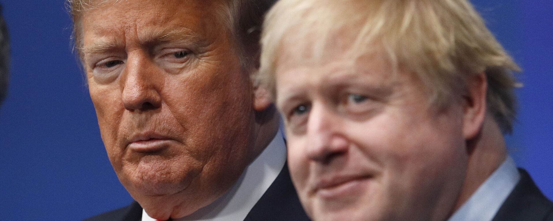 British Prime Minister Boris Johnson, right, and U.S. President Donald Trump pose during a group photo during a NATO leaders meeting at The Grove hotel and resort in Watford, Hertfordshire, England, Wednesday, Dec. 4, 2019 - Sputnik International, 1920, 17.12.2020