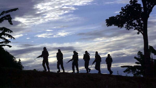 Indian army commandos patrol on a ridge during a jungle survival training session at the Counter Insurgency and Jungle Warfare School (CIJWS) in Vairengte, 38 miles north of Aizawal, capital of the northeastern India state of Mizoram, Saturday, Sept. 11, 2004 - Sputnik International