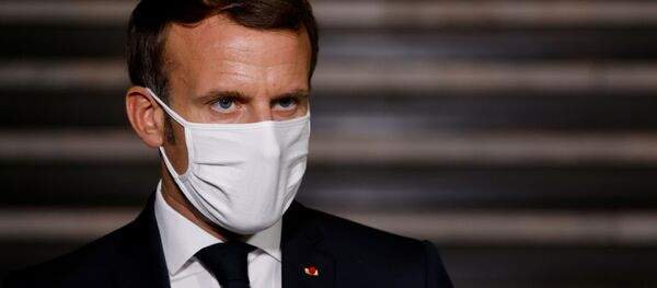 French President Emmanuel Macron wearing a face mask delivers a speech at the end of a visit about the fight against separatism at the Seine-Saint-Denis prefecture headquarters in Bobigny, near Paris, France October 20, 2020. French President Emmanuel Macron wearing a face mask delivers a speech at the end of a visit about the fight against separatism at the Seine-Saint-Denis prefecture headquarters in Bobigny, near Paris, France October 20, 2020. - Sputnik International