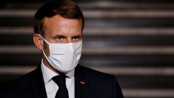 French President Emmanuel Macron wearing a face mask delivers a speech at the end of a visit about the fight against separatism at the Seine-Saint-Denis prefecture headquarters in Bobigny, near Paris, France October 20, 2020.  - Sputnik International
