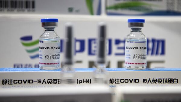 A China National Biotec Group (CNBG) vaccine candidate for COVID-19 coronavirus is on display at the China International Fair for Trade in Services (CIFTIS) in Beijing on September 6, 2020. - Sputnik International