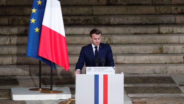 French President Emmanuel Macron delivers his speech in front of the coffin of slain teacher Samuel Paty during a national memorial event, in Paris, France October 21, 2020.  - Sputnik International