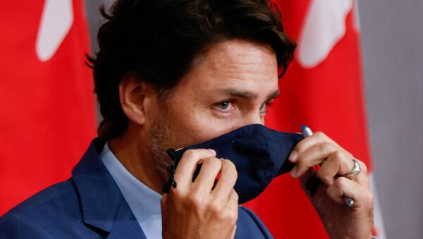 Canada's Prime Minister Justin Trudeau prepares to leave a news conference on Parliament Hill in Ottawa, Ontario, Canada September 25, 2020.   - Sputnik International