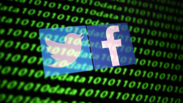 Twitter and Facebook logo along with binary cyber codes - Sputnik International