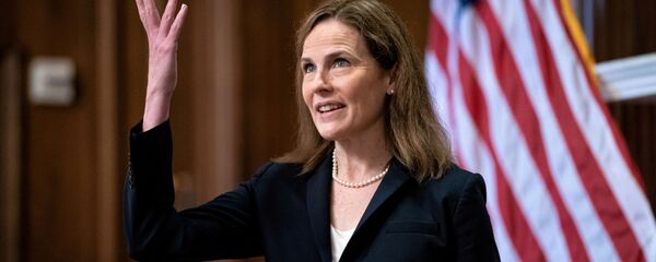 FILE PHOTO: Judge Amy Coney Barrett, US President Donald Trump's Nominee for Supreme Court, waves during a photo shoot before a meeting with Senator Roy Blunt (R-Mo) on Capitol Hill in Washington DC, US, 21 October 2020. FILE PHOTO: Judge Amy Coney Barrett, US President Donald Trump's Nominee for Supreme Court, waves during a photo shoot before a meeting with Senator Roy Blunt (R-Mo) on Capitol Hill in Washington DC, US, 21 October 2020. - Sputnik International