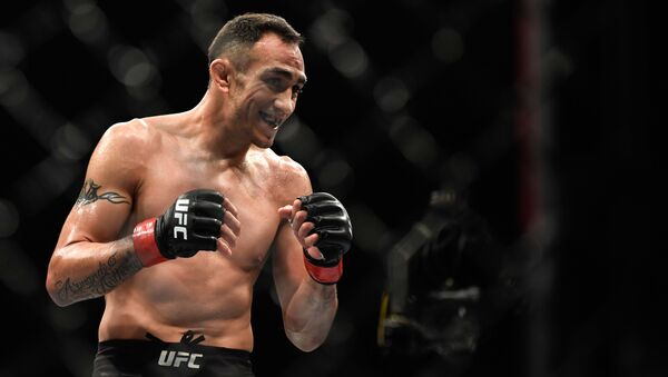  Tony Ferguson of the United States reacts in the Interim lightweight title fight against Justin Gaethje (not pictured) of the United States during UFC 249 at VyStar Veterans Memorial Arena on May 9, 2020 in Jacksonville, Florida - Sputnik International