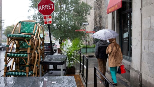 Chairs are stacked outside a bistro as the Quebec government has ordered all restaurants, bars and casinos to close for 28 days effective midnight September 30 as coronavirus disease (COVID-19) numbers continue to rise in Montreal, Quebec, Canada September 29, 2020.  - Sputnik International