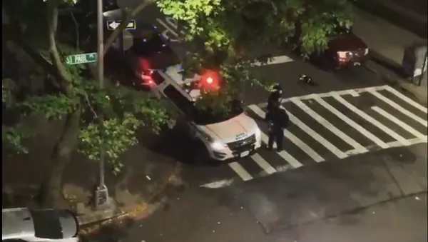 A screenshot from a video of a New York Police Department officer allegedly campaigning for the re-election of US President Donald Trump in the 2020 US presidential elections in Brooklyn, New York, on 24.10.2020. - Sputnik International