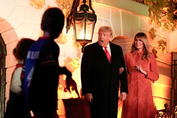 US President Donald Trump responds to a guest as he and Melania host a Halloween event at the White House in Washington, US, 25 October 2020.  - Sputnik International