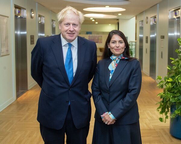 Boris Johnson May Demote Priti Patel Over 'Incompetent' Handling of Migration Crisis, Report Claims - Sputnik International