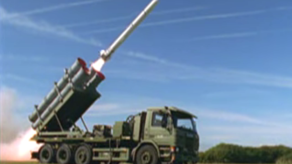 A Boeing test of a truck-mounted Harpoon Coastal Defense System in September 2000, which fires RMG-84 Harpoon anti-ship missiles - Sputnik International