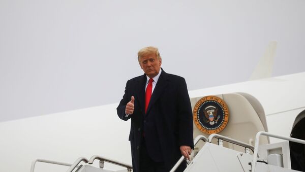 U.S. President Donald Trump gives a thumbs up as he arrives for a campaign event, at Murtha Johnstown-Cambria County Airport, in Johnstown, Pennsylvania, U.S., October 26, 2020. - Sputnik International