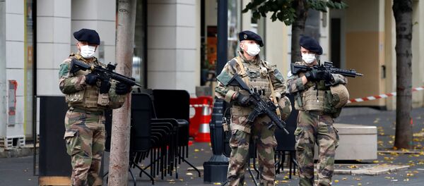 Special forces stand guard near the scene of a reported knife attack at Notre Dame church in Nice, France, October 29, 2020 - Sputnik International
