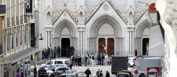 Security forces guard the area after a reported knife attack at Notre Dame church in Nice, France Security forces guard the area after a reported knife attack at Notre Dame church in Nice, France - Sputnik International