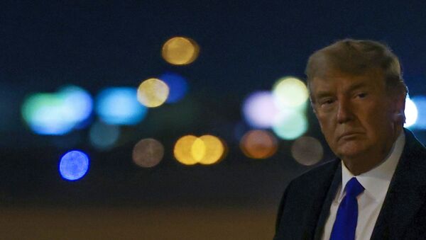 US President Donald Trump arrives aboard Air Force One at McCarran International Airport in Las Vegas, Nevada, U.S. October 27, 2020 - Sputnik International