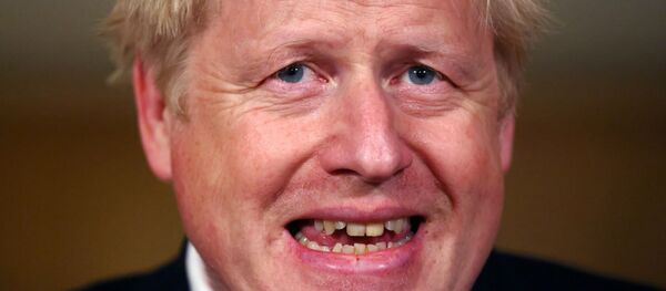 Britain's Prime Minister Boris Johnson attends a news conference amidst the spread of the coronavirus disease (COVID-19), at Downing Street in London, Britain, October 22, 2020. - Sputnik International