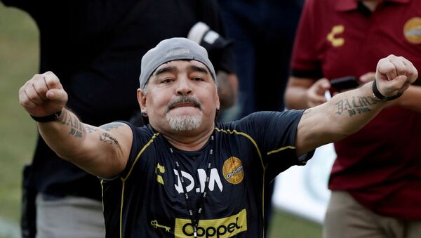 Argentinian soccer legend Diego Armando Maradona reacts to fans during his first training session as coach of Dorados at the Banorte stadium in Culiacan, in the Mexican state of Sinaloa, Mexico September 10, 2018. - Sputnik International
