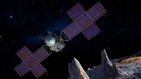 Artist's concept of the Psyche spacecraft, which will conduct a direct exploration of an asteroid thought to be a stripped planetary core. - Sputnik International