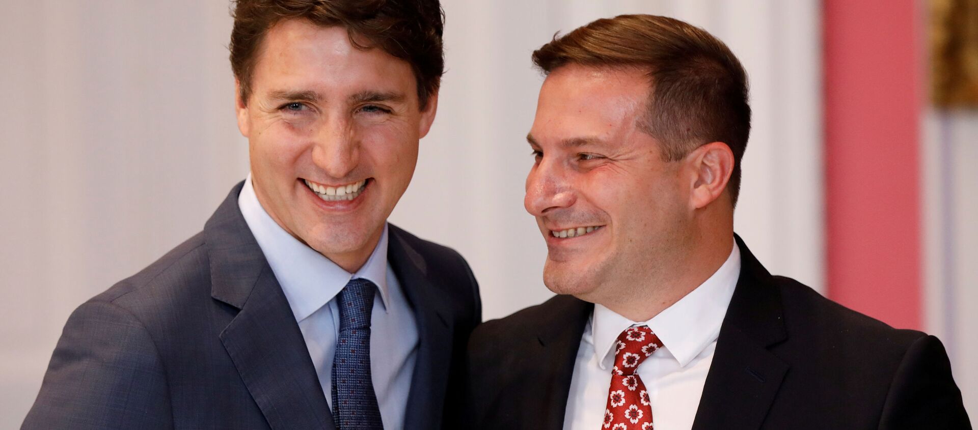 Marco Mendicino poses with Canada's Prime Minister Justin Trudeau after being sworn-in as Minister of Immigration, Refugees and Citizenship during the presentation of Trudeau's new cabinet, at Rideau Hall in Ottawa, Ontario, Canada November 20, 2019. - Sputnik International, 1920, 30.10.2020