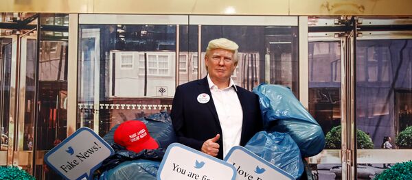 A wax figure depicting U.S. President Donald Trump is put into a dumpster at Madame Tussauds in Berlin, Germany, October 30, 2020.  - Sputnik International