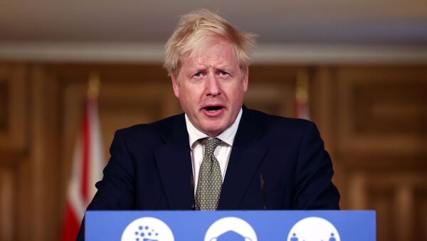 Britain's PM Johnson attends a news conference in London - Sputnik International