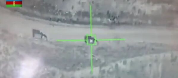 Screengrab from the Azerbaijan video allegedly showing the destruction of Armenian 'Grad' rocket launchers in Karabakh Screengrab from the Azerbaijan video allegedly showing the destruction of Armenian 'Grad' rocket launchers in Karabakh - Sputnik International