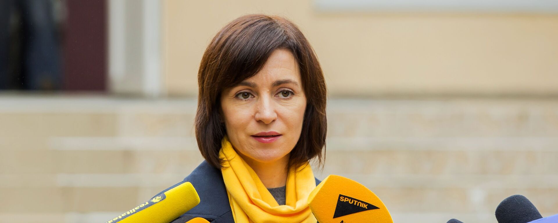 Prime Minister of the Republic of Moldova Maia Sandu answers questions from reporters during the elections at the polling station in Chisinau on October 20, 2019 during the local government elections in Moldova. - Sputnik International, 1920, 19.04.2023