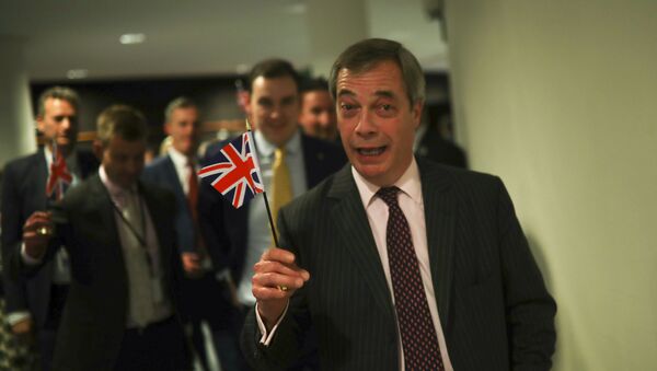 British European Parliament member Nigel Farage leaves the hemicycle after addressing European lawmakers during the plenary session at the European Parliament in Brussels, Wednesday, Jan. 29, 2020 - Sputnik International