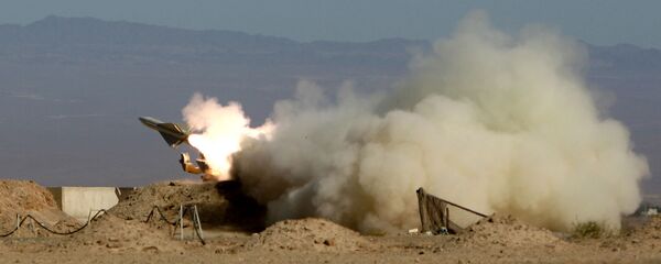 Iran's armed forces fires a missile during its air defense war game in the Isfahan province south of the capital Tehran, Iran, Wednesday, Nov. 25, 2009 Iran's armed forces fires a missile during its air defense war game in the Isfahan province south of the capital Tehran, Iran, Wednesday, Nov. 25, 2009 - Sputnik International