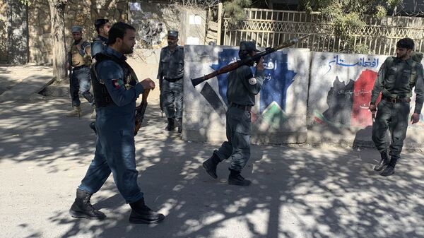 Afghan police arrive at the site of an attack at Kabul University in Kabul, Afghanistan, Monday, Nov. 2, 2020 - Sputnik International