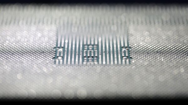 A Kunpeng 920 chip is displayed during an unveiling ceremony in Shenzhen, China, Monday, Jan. 7, 2019. Chinese telecom giant Huawei unveiled a processor chip for data centers and cloud computing as it expands into an emerging global market despite Western warnings the company might be a security risk.  - Sputnik International