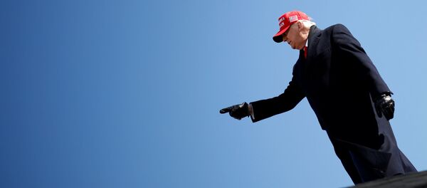 U.S. President Donald Trump gestures during a campaign rally at Fayetteville Regional Airport in Fayetteville, North Carolina, U.S., November 2, 2020. REUTERS/Carlos Barria - Sputnik International