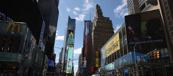  A general view of an empty Seventh Avenue at Times Square in the early afternoon on April 02, 2020 in New York City. - Sputnik International