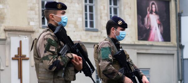 French soldiers patrol near the Saint Gery church in Cambrai as the country has raised the security alert for its territory to the highest level after the knife attack in the city of Nice, France, November 1, 2020 - Sputnik International