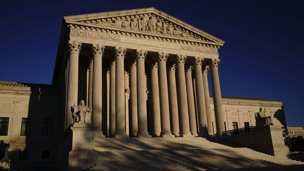 In this Monday, Nov. 2, 2020, file photo the Supreme Court is seen at sundown on the eve of Election Day, in Washington - Sputnik International