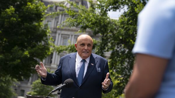 Rudy Giuliani, a personal attorney for President Donald Trump, talks with reporters outside the White House, Wednesday, July 1, 2020, in Washington. - Sputnik International