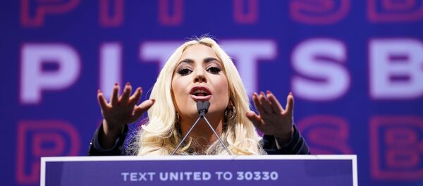 Lady Gaga speaks during a drive-in campaign rally held by Democratic U.S. presidential nominee and former Vice President Joe Biden at Heinz Field in Pittsburgh, Pennsylvania, U.S., November 2, 2020. - Sputnik International