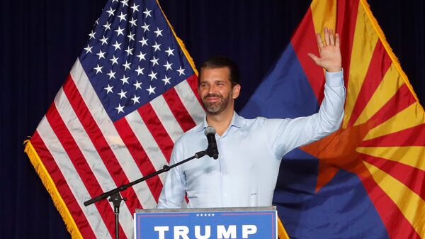 Donald Trump Jr. gestures during a campaign rally for U.S. President Donald Trump ahead of Election Day, in Scottsdale - Sputnik International