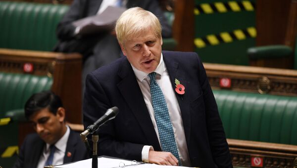 A handout photograph released by the UK Parliament shows Britain's Prime Minister Boris Johnson speaking in the House of Commons in London on 2 November 2020 on new coronavirus lockdown measures.  - Sputnik International