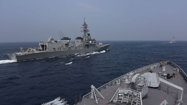 This handout photo taken and released by the Indian Navy on November 3, 2020 shows ships taking part in the Malabar exercise in the Bay of Bengal. - India, Australia, Japan and the United States started a strategic navy drill on November 3 in the Bay of Bengal, with all four countries keeping a wary eye on China's growing military power. - Sputnik International