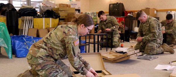 Wisconsin National Guard personnel assemble to assist in the state's coronavirus response. File photo. - Sputnik International