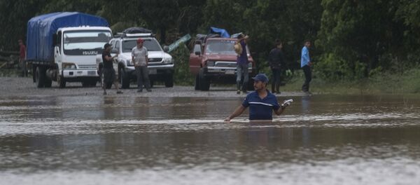 A man walks through a flooded road in Okonwas, Nicaragua, Wednesday, Nov. 4, 2020. Eta weakened from the Category 4 hurricane to a tropical storm after lashing Nicaragua's Caribbean coast for much of Tuesday, its floodwaters isolating already remote communities and setting off deadly landslides. A man walks through a flooded road in Okonwas, Nicaragua, Wednesday, Nov. 4, 2020. Eta weakened from the Category 4 hurricane to a tropical storm after lashing Nicaragua's Caribbean coast for much of Tuesday, its floodwaters isolating already remote communities and setting off deadly landslides. - Sputnik International
