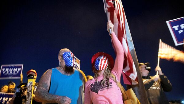 Mike and Wetonia Houlihan join other supporters of U.S. President Donald Trump during a Stop the Steal protest at the Clark County Election Center in North Las Vegas, Nevada, U.S. November 4, 2020. - Sputnik International