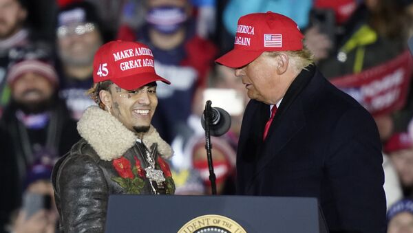 President Donald Trump brings rapper Lil Pump to the podium during a campaign event early Tuesday, Nov. 3, 2020, in Grand Rapids, Mich.  - Sputnik International